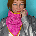 Cowl with deep v at the front crocheted in a waffle stitch in screaming pink with yellow edging