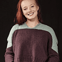 Long-sleeved variation on a puffed sleeve pullover with vertical bands of texture on the front and back