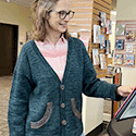 Short-sleeved variation on a puffed sleeve pullover with vertical bands of texture on the front and back