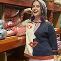The Barbra, an intarsia pullover with a stylized Barbie-style face