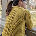 Divergenerate zippered cardigan - reverse stockinette panels and angled cables
