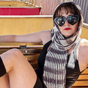 syncopated brioche scarf in stripes reminiscent of Gold-Medal Olympian Alysa Liu's signature hair color 