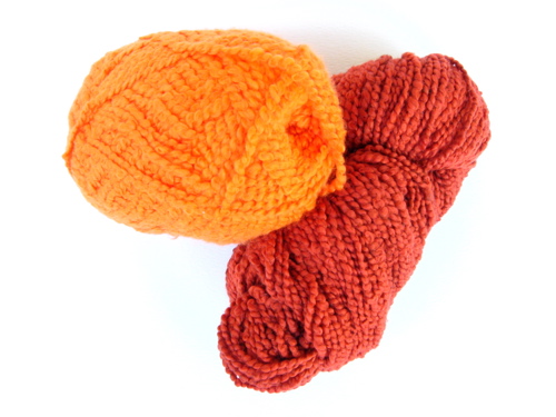 yellow-orange | orange plastic | yarn