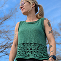 tank top that combines knitted stockinette and crocheted filet lace at the hem