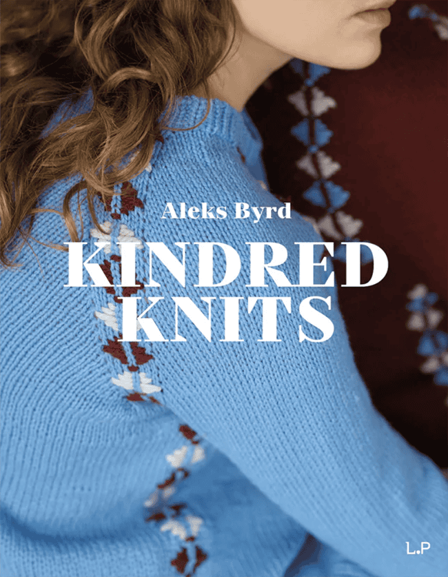 The cover of Kindred Knits featuring a medium blue raglan sweater with red and white embellishment.