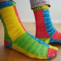 Sock with two sections of four quandrants, each in different colors