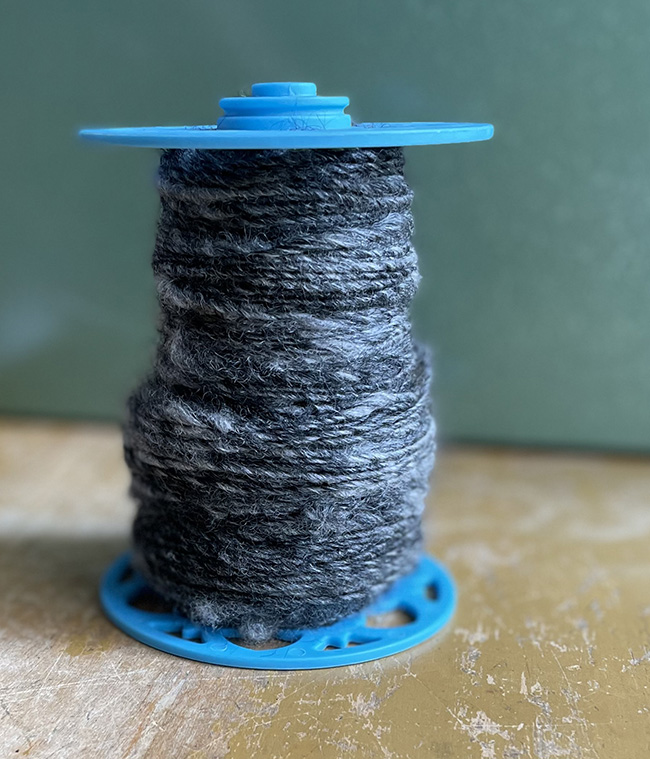 How to Use a Yarn Bobbin Holder - Repeat Crafter Me